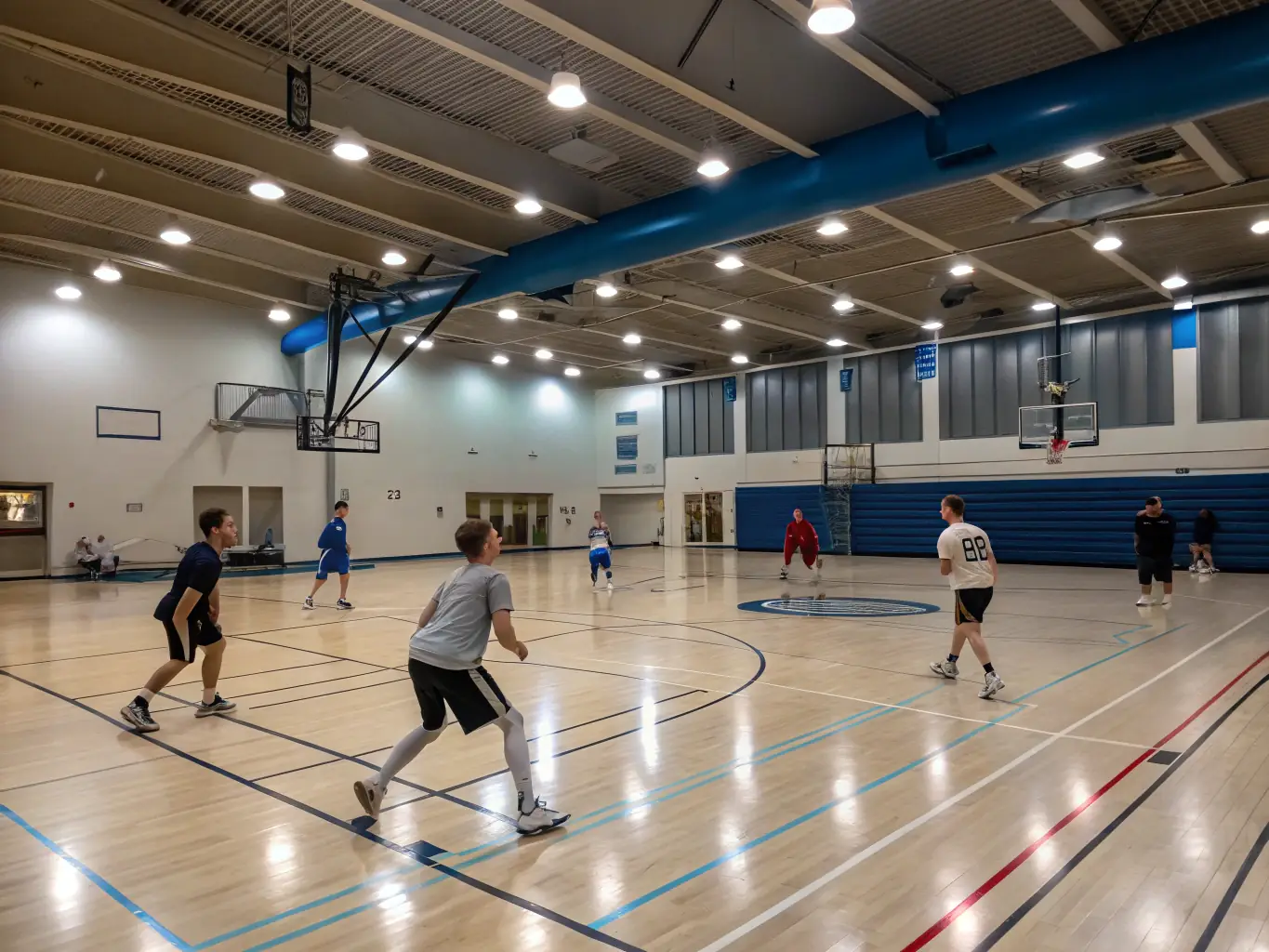 A diverse group of ASS TASDON BASKET members participating in a friendly basketball match, showcasing the inclusive and community-oriented spirit of the club.